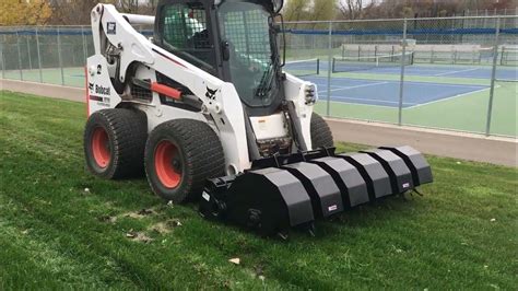 aerater attachment for skid steer|bobcat skid steer attachments.